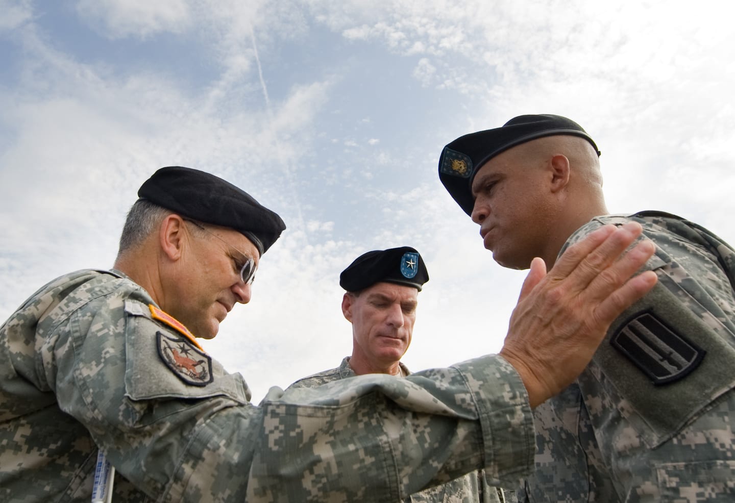 Army Times 2009 "Soldier of the Year" 1st Sgt Peter J. Lara talks with Chief of Staff of the Army, Gen. George W. Casey Jr., and Brig. Gen. Bradley May at Ft. Jackson, SC, on Jul. 30, 2009. US Army photo by D. Myles Cullen (released)