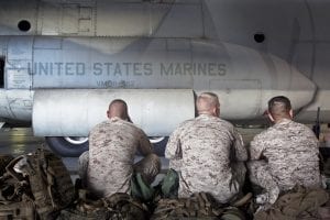 Marines with 25th Marine Regiment wait for their flight to Maputo, Mozambique July 21, 2010 at Steward Air National Guard Base, N.Y. The Marines are traveling to Africa to participate in Exercise Shared Accord 2010, a humanitarian and peacekeeping operation.