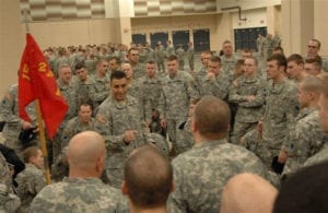 Indiana National Guard Soldier, Sgt. Maj. Euripides Perez, 2nd Battalion, 150th Field Artillery, briefs Soldiers before entering the field level of Lucas Oil Stadium at the Welcome Home Celebration, Saturday, Jan. 31. Indiana National Guard troops were honored at the celebration for their deployment in support of the Global War on Terror in 2008.