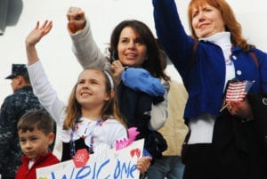 110324-N-QW737-005<br /> EVERETT, Wash. (March 24, 2011) Family and friends wait for the arrival of the aircraft carrier USS Abraham Lincoln (CVN 72). Abraham Lincoln returned home from a six-month deployment in the U.S. 5th and 7th Fleet areas of responsibility supporting maritime security operations and theater security cooperation efforts. (U.S. Navy photo by Mass Communication Specialist 1st Class Michael E. Wagoner/Released)