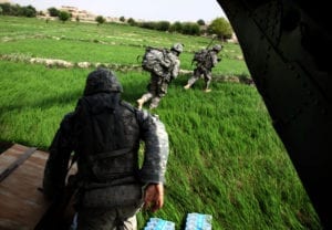 KHOST PROVINCE, Afghanistan  U.S. Army Paratroopers from 2nd Battalion, 377th Parachute Field Artillery Regiment, 4th Brigade Combat Team, 25th Infantry Division, run off a CH-47 Chinook Helicopter during an air-assault mission to search the area of Khost province, Afghanistan during Operation Champion Sword, July 29. Operation Champion Sword is a joint operation involving Afghanistan National Security Forces and International Security Assistance Forces focused on specific militant targets and safe havens within eastern Afghanistan. (Photo by U.S. Army Spc. Matthew Freire, 55th Signal Company)