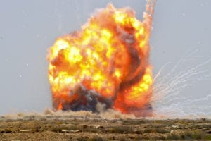 A controlled detonation set off by U.S. Soldiers with 725th Explosive Ordnance Disposal Team, 441st EOD Battalion, Task Force Troy and Iraqi soldiers with Iraqi Bomb Disposal Company, 9th Army Disposal to destroy unexploded ordinances outside Bassami, Iraq, July 13. The Iraqi Bomb Disposal Company with support and guidance from U.S. Soldiers with 725th Explosive Ordnance Disposal Team, 441st EOD Battalion, Task Force Troy have been tasked to destroy unexploded ordnances found in Iraq in support of Operation Iraqi Freedom. (U.S. Army photo by Pfc. Gary Silverman)