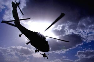 A U.S. Special Operations team member is hoisted into a UH-60 aircraft during a medical evacuation training evolution June 13, at Multinational Base Tarin Kowt in Uruzgan province, Afghanistan. Coalition Special Operations team members routinely conduct refresher training in medical evacuation evolutions to prepare for contingencies while operating in the field. (U.S. Air Force photo by Staff Sgt. Ryan Whitney)(Released)