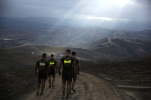 Marines assigned 1st Marine Division, run along hills during the Dark Horse Ajax Challenge aboard Marine Corps Base Camp Pendleton, California, Aug. 20, 2015. The eight-mile course tested the Marines’ and Sailors’ endurance and leadership skills with trials spread across the San Mateo area.<br /> (U.S. Marine Corps photo by Cpl. Will Perkins/Released)