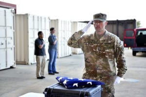 U.S. Army Staff Sgt. Richard Walton, assistant operations noncommissioned officer, Indo-Pacific directorate, Defense POW/MIA Accounting Agency (DPAA), renders honors during an honorable carry for the possible remains of unidentified U.S. service members lost during the Vietnam War at Joint Base Pearl Harbor-Hickam, Hawaii, Mar. 31, 2019. The remains were recently received through a unilateral transfer from the Kingdom of Cambodia as part of DPAA’s efforts to provide the fullest possible accounting of our missing personnel to their families and the nation. (U.S. Army photo by Staff Sgt. Jamarius Fortson)