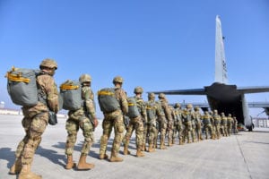 U.S. Army Paratroopers assigned to the 173rd Airborne Brigade, prepare to board a U.S. Air Force C-130 Hercules aircraft from the 86th Air Wing at Aviano Air Base, in preparation for airborne operations onto Juliet Drop Zone, Pordenone, Italy Feb. 21, 2019. The 173rd Airborne Brigade is the U.S. Army Contingency Response Force in Europe, capable of projecting ready forces anywhere in the U.S. European, Africa or Central Commands' areas of responsibility. (U.S. Army Photo by Paolo Bovo)