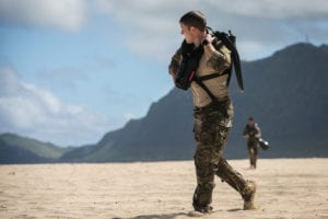 U.S. Army Rangers assigned to Bravo Company, 2nd Battalion, 75th Ranger Regiment, walk back to the equipment turn-in point on the beach following a helocast insertion at Bellows Air Force Station, Hawaii, Nov. 14, 2018. 25th Infantry Division Lightning Academy waterborne operations, off the coast of Hawaii, offers a unique training environment and partnership opportunity for United States Army Special Operations Forces and the 25th Infantry Division. (U.S. Army photo by 1st Lt. Ryan DeBooy)