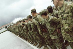 Soldiers of the 838th Military Police Company out of Youngstown, Ohio dress-right-dress during the Platinum Wolf opening ceremony June 3 at South Base in Serbia. The international exercise aims to enhance interoperability and mutual understanding among the members of partner and allied nations' armed forces for peace support operations. About 500 Soldiers are involved in the 2019 Platinum Wolf exercise.