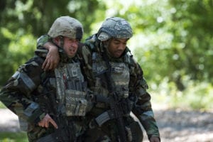 Tech. Sgt. Nathaniel Mace, 23rd Security Forces Squadron flight chief, left, assists wounded personnel to a Humvee after responding to a simulated ground attack during exercise FT 19-04, April 17, 2019, at Moody Air Force Base, Ga. The 23rd SFS responded to a surface-to-air site through a ground attack and ambush, resulting in the Airmen providing self-aid buddy care and escorting wounded personnel to a medical facility. The exercise focused on high operations tempo and the ability to survive and operate in a chemical, biological, radioactive and nuclear environment to meet chief of Staff of the Air Force and the commander of Air Combat Command’s intent for readiness. (U.S. Air Force photo by Senior Airman Erick Requadt)