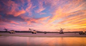 Three CH-53E Super Stallion’s with Marine Heavy Helicopter Squadron (HMH) 461, are stationary on the flight line in Brunswick, Maine, July 17, 2019. The purpose of HMH-461’s deployment for training is to increase the squadron’s proficiency in mountainous terrain operations, to conduct mission essential tasks in a challenging environment, and improve combat readiness. (U.S. Marine Corps photo by Cpl. Micha Pierce)