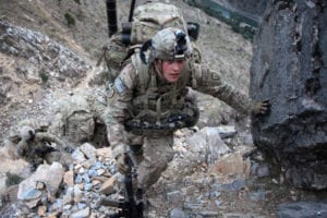 U.S. Army Spc. Daniel Hatfield, from 1st Platoon, Charlie Company, 2nd Battalion, 27th Infantry Division, Task Force No Fear, climbs a hill while conducting a patrol from Outpost Mace to Outpost Fawlad, during Operation Toufan Fawlad, in the Naray district, Kunar province, Nov. 17, 2011. U.S. soldiers of Charlie Company, 2nd Battalion, 27th Infantry Division, Task Force No Fear, are building watch positions to enable the ANSF to re-establish OP Fawlad.