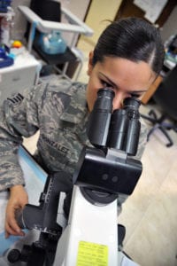 Staff Sgt. Lluvia L. Gonzalez performs a microscopic urinalysis as part of her duties as a medical laboratory technician Nov. 8, 2011, at the 386th Expeditionary Medical Group, in Southwest Asia. (U.S. Air Force photo/Master Sgt. Carlotta Holley)