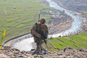 U.S. Army Spc. Gerald Schumacher of 2nd Battalion, 35th Infantry Regiment, 3rd Brigade Combat Team, 25th Infantry Division, climbs a mountain Jan. 11, 2012, in Watapur district, Kunar province, Afghanistan.