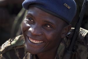 A soldier with the Armed Forces for the Defense of Mozambique (FADM) listens as Marines explain how to prepare a Meal Ready to Eat (MRE) July 30, 2010. Marines with the 25th Marine Regiment spent part of the day demonstrating to the Mozambicans how Marines survive in the field. U.S. service members are partnering with the Mozambican military for Exercise SHARED ACCORD 2010, a 10-day, bi-lateral U.S.-Mozambican exercise coordinated for U.S. Africa Command by its Marine component, U.S. Marine Forces Africa. The exercise runs Aug. 3-13.