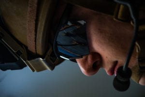 PHILIPPINE SEA (April 15, 2020) A Marine with the 31st Marine Expeditionary Unit’s (MEU) Maritime Raid Force (MRF) watches as his fellow Marines fast rope during a fast rope and deck shoot rehearsal aboard amphibious assault ship USS America (LHA 6). The training simulated a helicopter insert into an opposed Visit, Board, Search and Seizure, one of the main mission sets of the MRF. America, flagship of the America Expeditionary Strike Group, 31st MEU team, is operating in the U.S. 7th Fleet area of operations to enhance interoperability with allies and partners and serve as a ready response force to defend peace and stability in the Indo-Pacific region. (Official U.S. Marine Corps photo by Cpl. Isaac Cantrell)