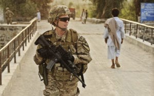 Air Force Tech. Sgt. Angela Pollard, medic attached to Laghman Provincial Reconstruction Team, secures a bridge in Mehtar Lam, Laghman province, Sept. 7. A civil engineer team from the PRT traveled to the Jugi bridge in Mehtar Lam to asses the structural integrity following its recent completion, ensuring it will withstand the Afghan weather for years to come.