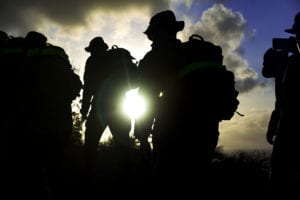 U.S. Marines with Headquarters Battalion (HQBN), Marine Corps Base Hawaii, Kaneohe Bay, ascend to the top of the Kansas Tower hill during a 6 mile hike around the base, Oct. 6, 2017. The hiking program is designed to increase physical and mental stamina, build espirit de corps and bolster combat readiness in the Marines with HQBN. (U.S. Marine Corps photo by Sgt. Ricky Gomez)