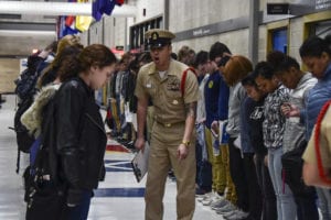 GREAT LAKES, Ill. (April 4, 2018) Chief Hospital Corpsman Jaime Kalaw, center, motivates new recruits as they line up inside the Golden 13 recruit in-processing center at Recruit Training Command (RTC). Approximately 38,000 to 40,000 Sailors graduate annually from the RTC. (U.S. Navy photo by Mass Communication Specialist 1st Class Amanda S. Kitchner/Released) 180404-N-IY633-046<br /> Join the conversation:<br /> http://www.navy.mil/viewGallery.asp<br /> http://www.facebook.com/USNavy<br /> http://www.twitter.com/USNavy<br /> http://navylive.dodlive.mil<br /> http://pinterest.com