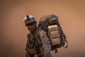 FIREBASE UM JORAIS, IRAQ – A U.S. Marine with 3rd Battalion, 7th Marine Regiment, 1st Marine Division attached to Special Purpose Marine Air-Ground Task Force, Crisis Response-Central Command (SPMAGTF-CR-CC) prepares to board an MV-22 Osprey at Fire Base Um Jorais (FB UJ) July 6, 2018. SPMAGTF-CR-CC Marines assisted in Operation Talon Spear by providing security at FB UJ. (U.S. Marine Corps Photo by Cpl. Carlos Lopez)