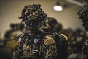 A U.S. Army Paratrooper dons his parachute while participating in Immediate Response 19 at Aviano Air Base, May 13, 2019. Exercise Immediate Response is a multinational exercise co-led by Croatian Armed Forces, Slovenian Armed Forces and U.S. Army Europe. The logistics-focused exercise is designed to test and improve the ability to move forces and equipment rapidly from one location to another. The exercise will improve readiness and interoperability among participating allied and partner nations.