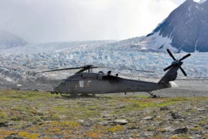 An Alaska Air National Guard HH-60 Pave Hawk waits for the weather to clear before making another attempt to reach the survivors of a plane crash Aug. 8, 2010, five miles from the Knik Glacier crash site. (Alaska National Guard photo/Master Sgt. Sean Mitchell)