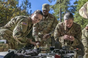 Candidates participating for the Expert Field Medical Badge disassemble and reassemble an M4 rifle as quickly as possible during the standardization phase of EFMB testing on Fort Bragg, N.C., Oct. 30, 2018. The first week of testing introduces the candidates to all the tasks that they’ll be expected to complete to earn the coveted badge. The EFMB was established to showcase and recognize medical Soldiers for their exceptional skill level and competence in the medical field. The testing consists of a written exam, land navigation, three separate combat testing lanes and concludes with a 12-mile ruck march. (U.S. Army photo by Spc. Liem Huynh / 22nd Mobile Public Affairs Detachment)